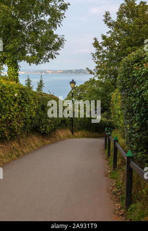 Devon, UK - August 2nd 2019: Pedestrian pathway leading down to Clovelly Village from Mount Pleasant in North Devon, UK. Stock Photo