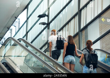 People on escalator Stock Photo