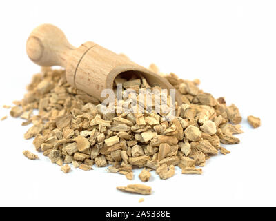 Kalmus root on a spice scoop, isolated against white background Stock Photo