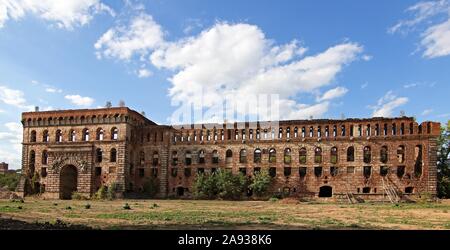 granary ruins in Poland, old large red brick building, Stock Photo