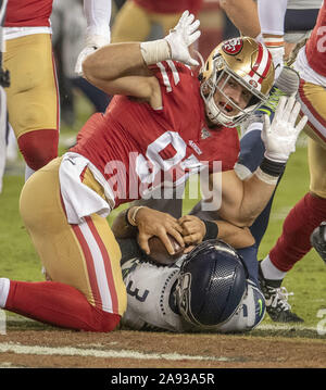 Seattle Seahawks defensive end Quinton Jefferson (99) reacts after