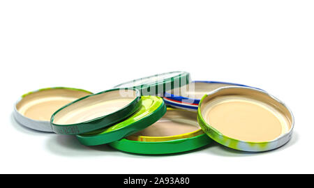 Old canning lid against white background Stock Photo