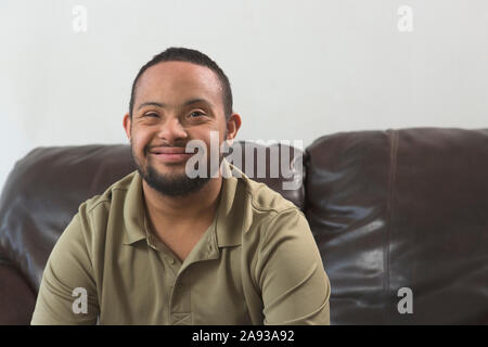 Portrait of an african man with Down syndrome is in an African