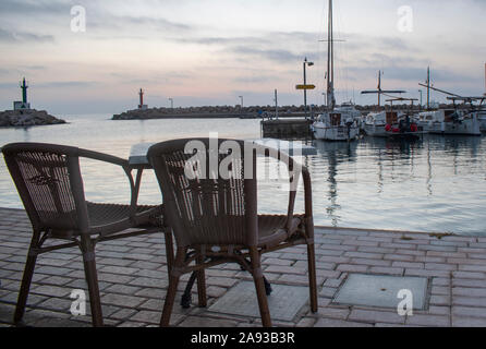 Sunrise just before the Sun peeps over the horizon at Cala Bona Marina Majorca. Stock Photo