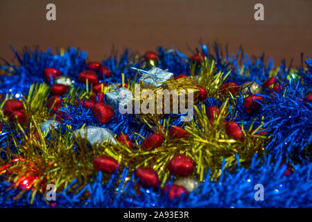 Christmas gift packages in the middle of the decorations Stock Photo