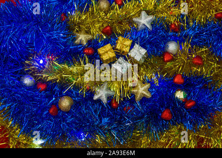 Christmas gift packages in the middle of the decorations Stock Photo