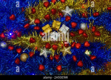 Christmas gift packages in the middle of the decorations Stock Photo