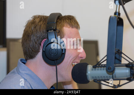 Young man with Cerebral Palsy at work Stock Photo