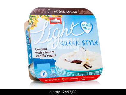 LONDON, UK - NOVEMBER 08, 2019: Pack of Muller Light Greek Style Yogurt with coconut and vanilla on white. Stock Photo