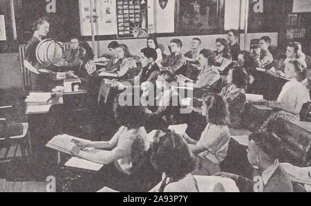 American seventh grade class in High School learning geography 1930s. Stock Photo