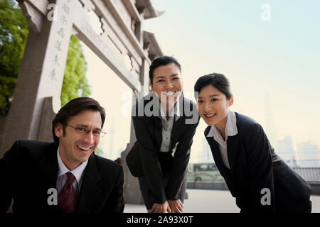 Portrait of three smiling business colleagues. Stock Photo