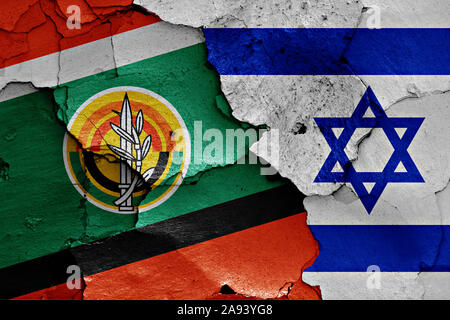 flags of Israeli Army and Israel painted on cracked wall Stock Photo