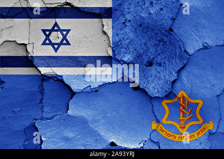 flag of Israel Defense Forces painted on cracked wall Stock Photo