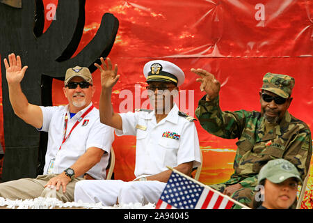 Three veterans from three branches of the military at the Veterans day parade in Tucson AZ Stock Photo