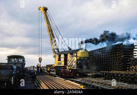 Steam powered crane at the British Rail Beighton depot, 1978 or 79.   Near Sheffield, Yorkshire, England, UK Stock Photo