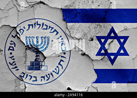 flags of Mossad and Israel painted on cracked wall Stock Photo