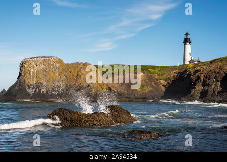 A beautiful lighthouse is found at Yaquina Head on the Oregon Coast; Newport, Oregon, United States of America Stock Photo