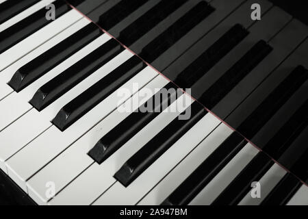 Piano keyboard. Full frame vertical view of a grand piano keyboard. Stock Photo