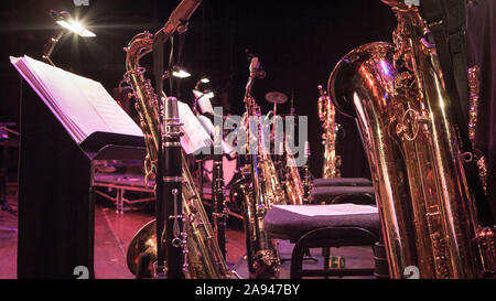 Saxophone section. A break in rehearsals for the horn section of a big band. Stock Photo