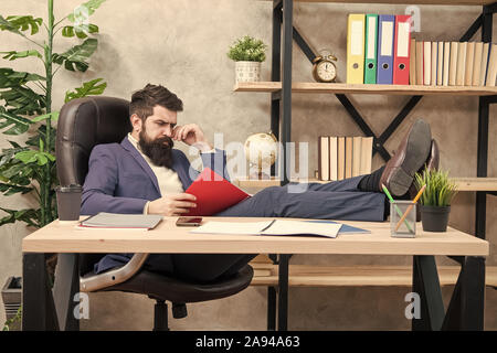 Owner of small business. Man bearded businessman sit office read business report. Analyzing financial report. Accounting and banking. Guy banker accountant learn indicators markers. Financial report. Stock Photo
