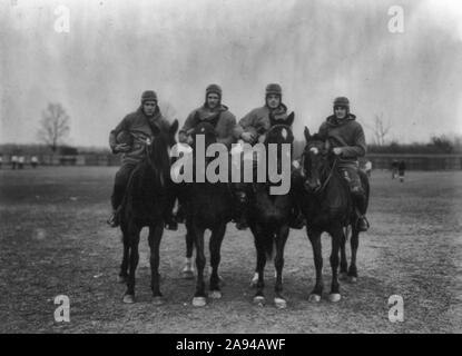 The four horsemen of the football apocalypse (Notre Dame backfield) - Photograph shows four football players on horseback holding footballs, circa 1924 Stock Photo