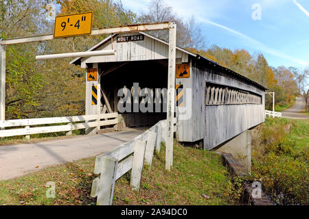 The Root Road Bridge is one of 19 wooden covered bridges in Ashtabula County in Northeast Ohio USA. Stock Photo