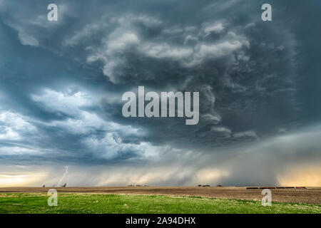 Dramatic storm clouds during a thunderstorm on the prairies; Val Marie, Saskatchewan, Canada Stock Photo