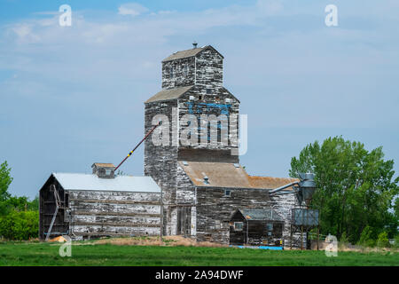 Weathered grain elevator on the prairies; Val Marie, Saskatchewan, Canada Stock Photo