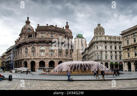 Italy, Genoa - October 1, 2014: Piazza Raffaele De Ferrari square with fountain and Palazzo della Nuova Borsa Palace barocco style building in Stock Photo