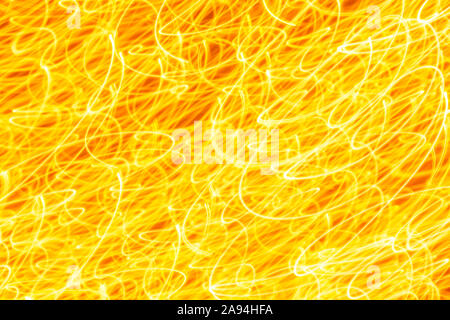 Futuristic blurred lights holiday monochrome background in yellow. Horizontal, soft focus Stock Photo