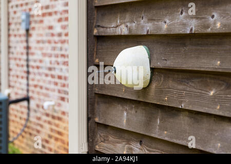 Faucet cover installed on water faucet to protect it from freezing temperatures Stock Photo