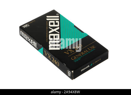 Stockholm, Sweden - November 12, 2019: Maxell VHS 1990s era video cassette with cover isolated on white background. Stock Photo