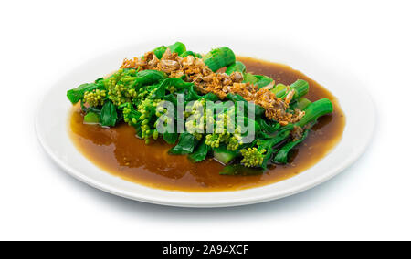 Stir Fried Chinese kale in Oyster sauce ontop with Crispy Garlic Goodtasty Of Food. Asian Food Dish  Vegetarian Style side view Stock Photo