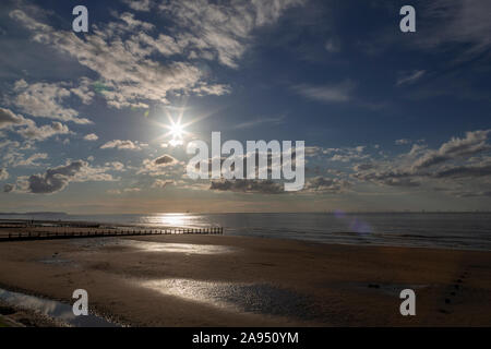 Sunset over the beach at Rhyl on the North Wales coast Stock Photo