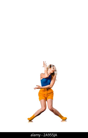 An urban woman is doing breakdance in the studio Stock Photo