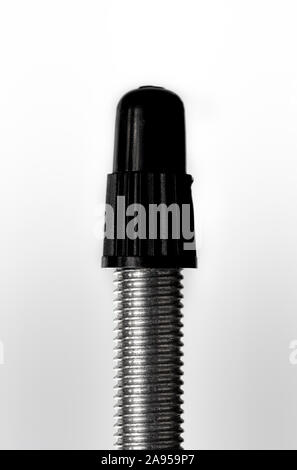 Macro image of a presta bicycle valve against a white background Stock Photo