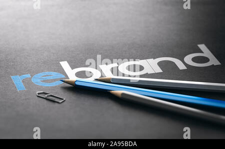 Word rebrand with the prefix re handwritten over black paper background, Marketing and brand management concept. 3D illustration Stock Photo