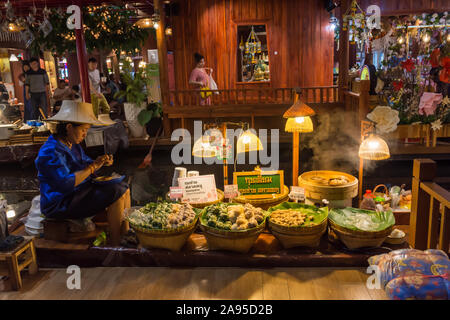 Iconsiam ,Thailand -Oct 30,2019: Ground floor floating market in Iconsiam shopping mall can get the Thai snacks, shops for regional handicraft. Stock Photo
