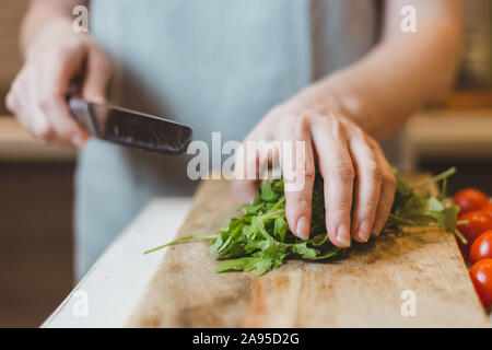 Pumpkin sandwiches with white cream cheese and green avocado on a fresh baguette - home recipe for making bruschetta Stock Photo