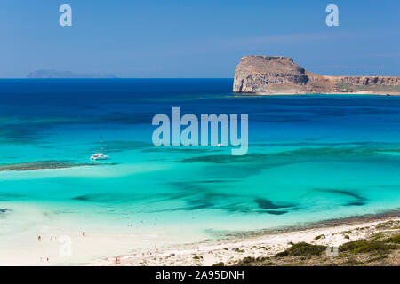 Balos, Chania, Crete, Greece. View over the clear turquoise waters of Gramvousa Bay from hillside above the beach. Stock Photo