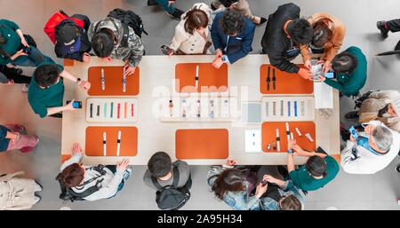 Crowd at the Apple Store shopping, table with watches, iWatch, Ginza, Chuo City, Tokyo, Japan Stock Photo