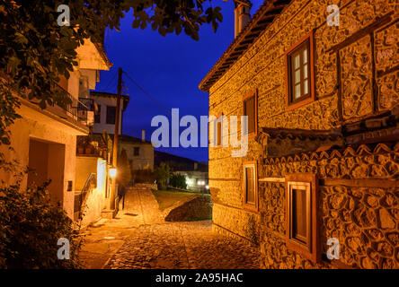 Evening in the old Doltso  district of Kastoria,with its old Ottoman houses and cobbled streets Macedonia, Northern Greece. Stock Photo