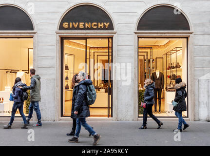 Givenchy Window display, Avenue Montaigne, Paris - people walk in