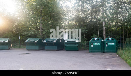 iron recycling containers on the street closeup Stock Photo
