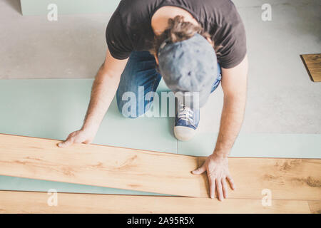 Connection of two laminate panels across a short joint in the lock Stock Photo