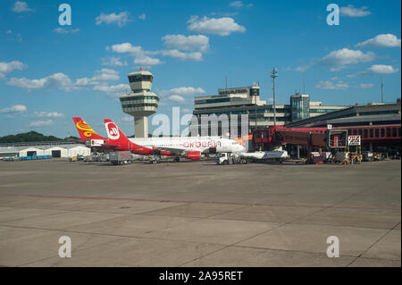 06.06.2016, Berlin, Germany, Europe - An Air Berlin passenger plane is parked at a gate at Tegel Airport. Stock Photo