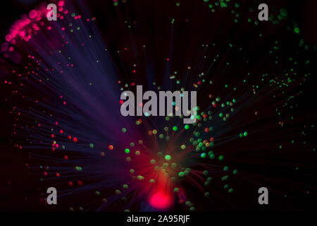 blurred golden happy lights on dark background Stock Photo
