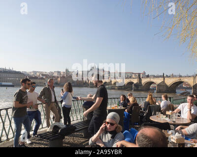 Restaurant Lávka next to the Smetana museum has open air service with view of the Charles Bridge a landmark in Prague Czech Republic Stock Photo