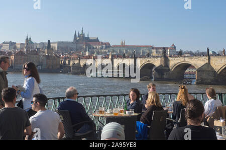 Restaurant Lávka next to the Smetana museum has open air service with view of the Charles Bridge a landmark in Prague Czech Republic Stock Photo