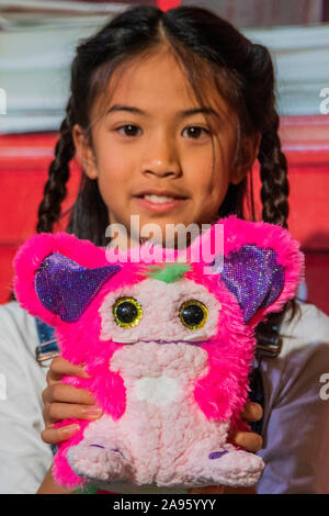 London, UK. 13th Nov, 2019. Rizmo by TomyToy with Fiona, 10 -  Retailer’s Association reveal the 2019 DreamToys list. Credit: Guy Bell/Alamy Live News Stock Photo